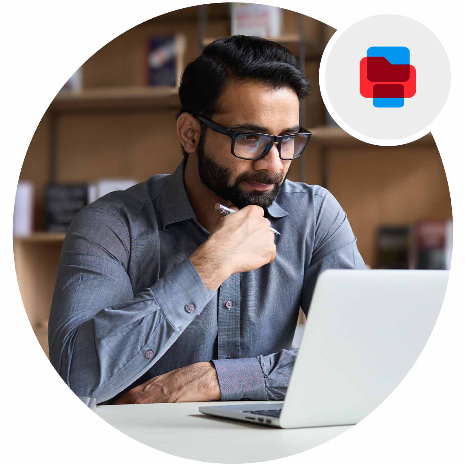Person looking intently at laptop