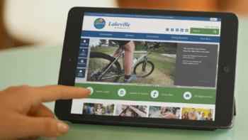 Tablet displaying the City of Lakeville, MN website