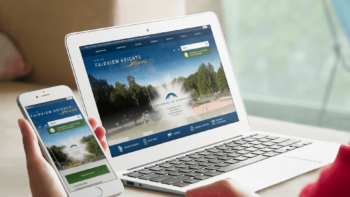 Phone and laptop screens showing the Fairview Heights website